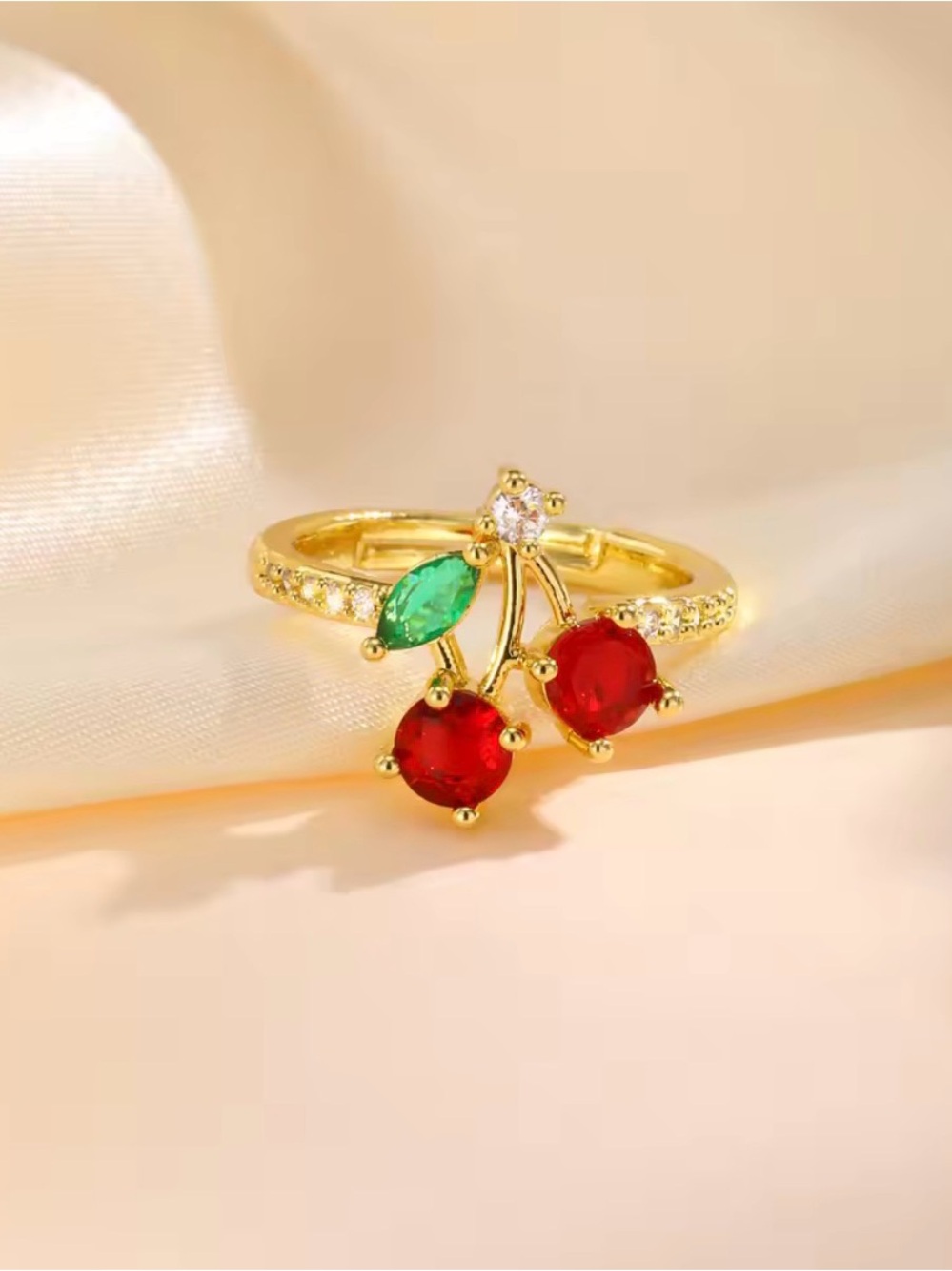 Gold Cherry Cocktail Ring with Red Stones and Green Leaf
